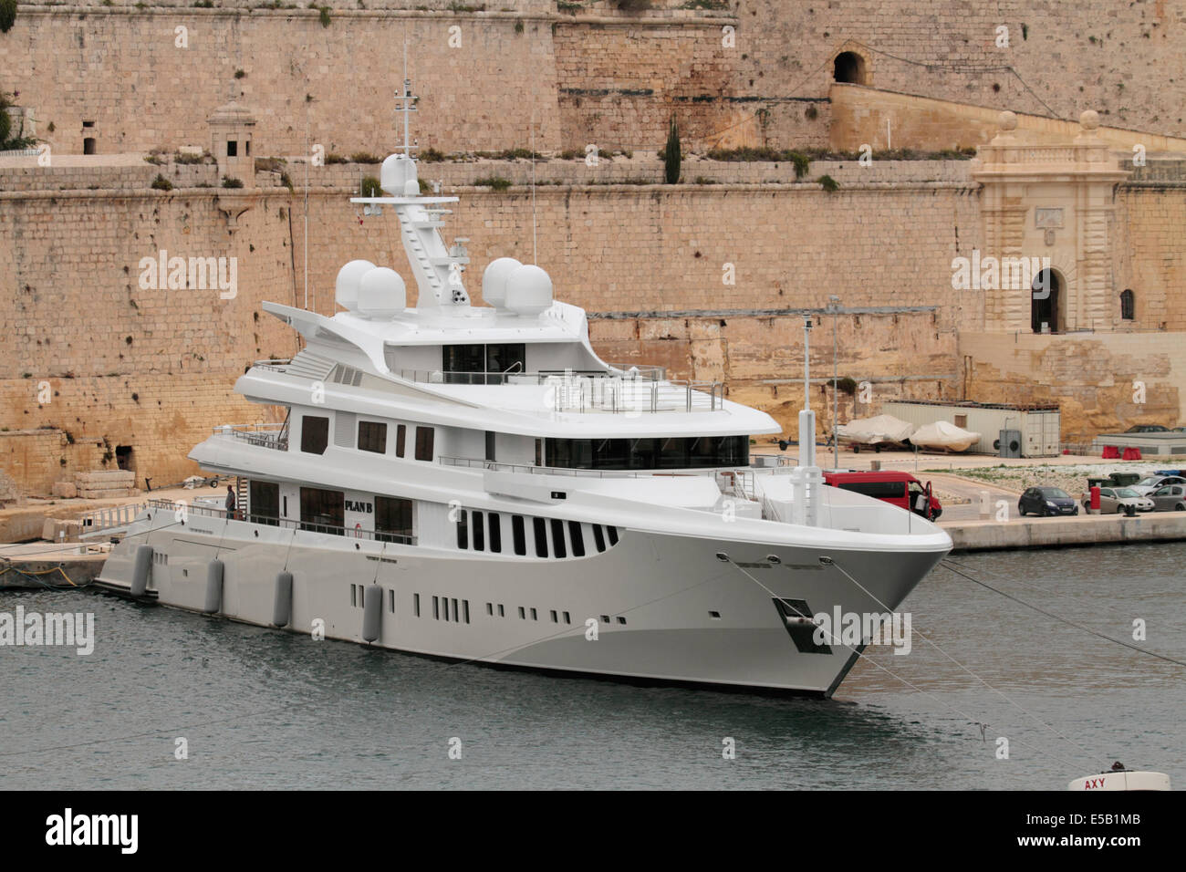 The 73-metre ADM Shipyards superyacht Plan B moored beneath Fort St Angelo in Malta Stock Photo