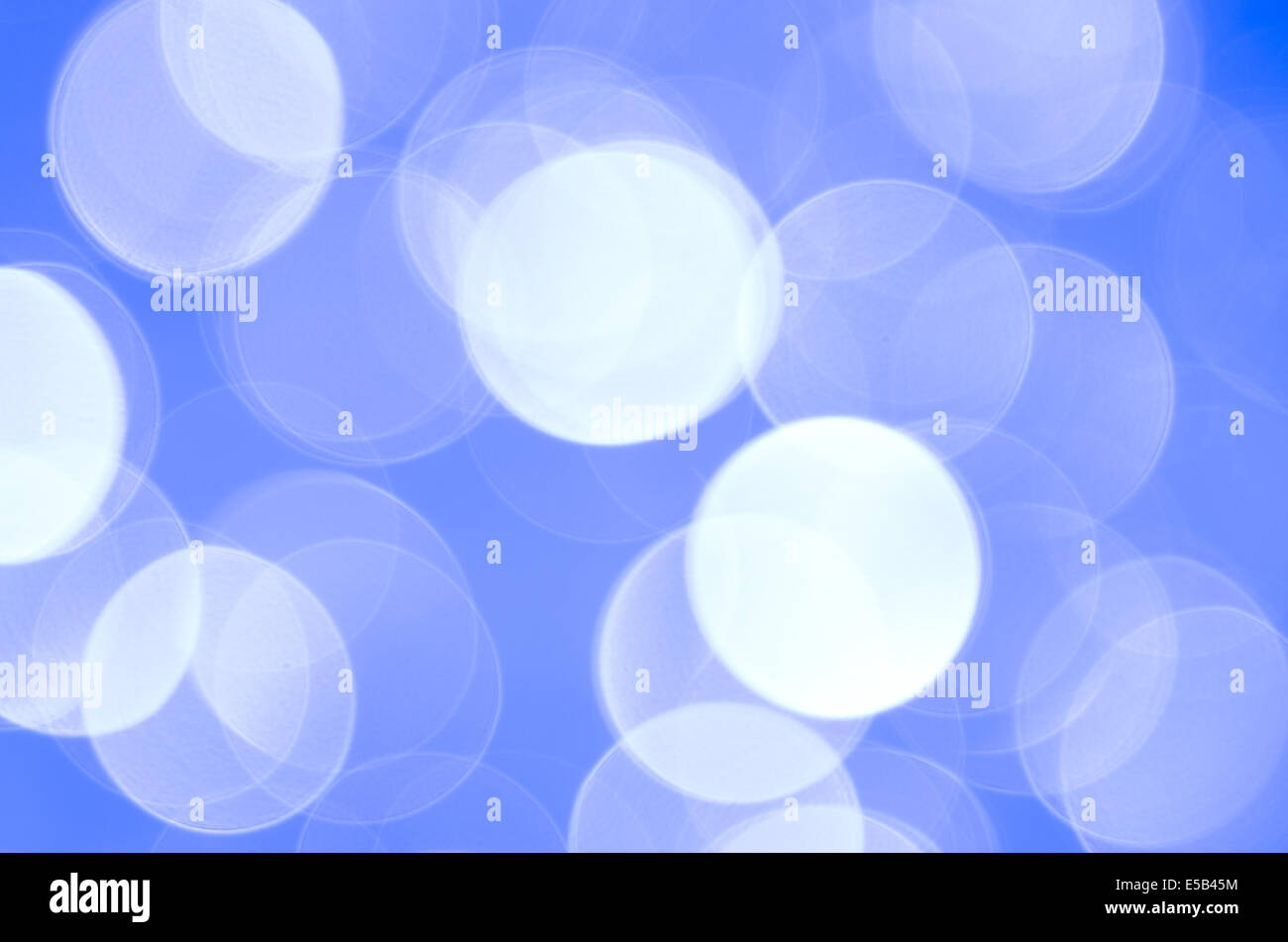 Background with blue bokeh lights Stock Photo - Alamy