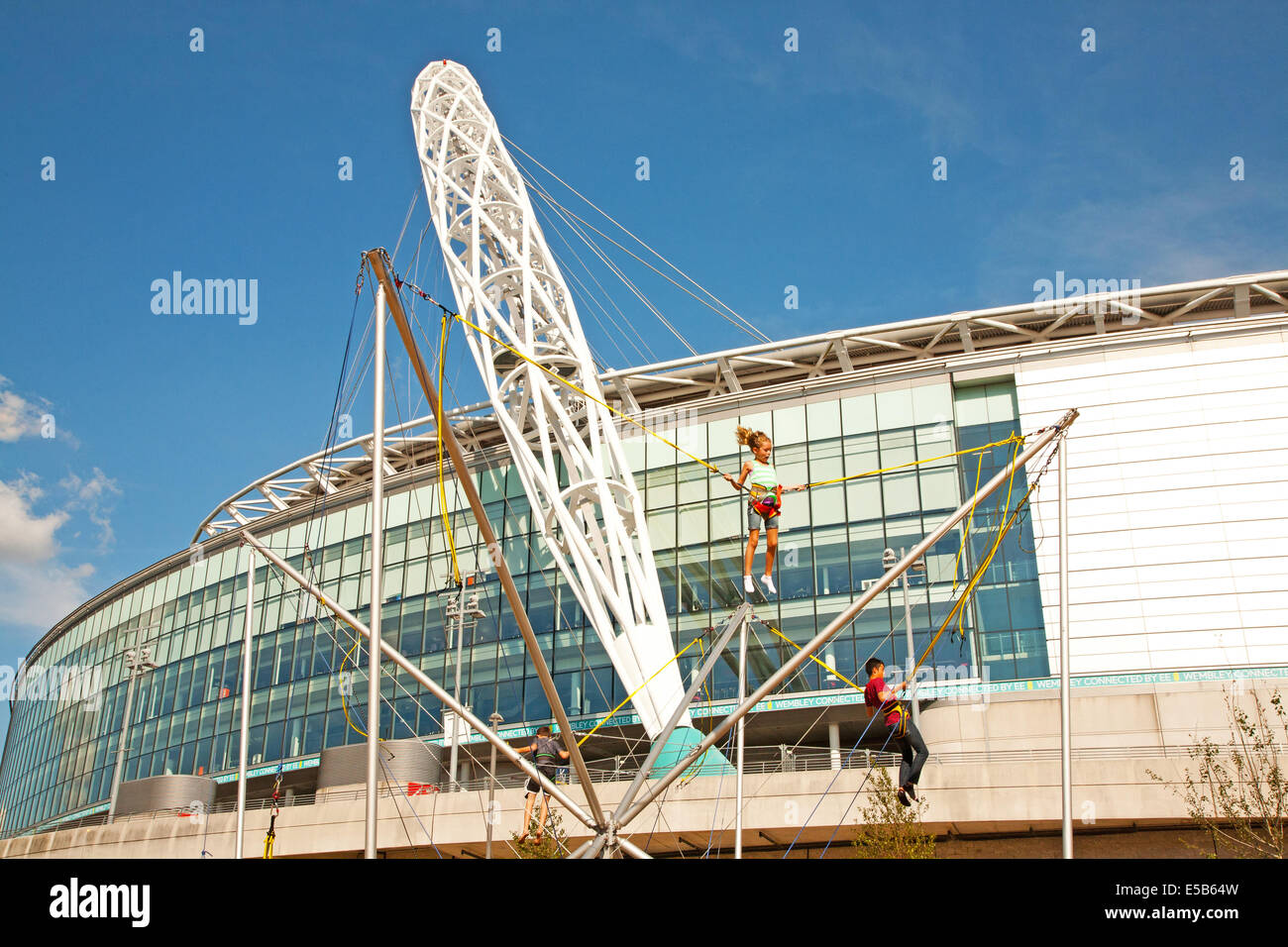 The bungee trampoline outside Wembley stadium.Wembley,London,UK Stock Photo Alamy