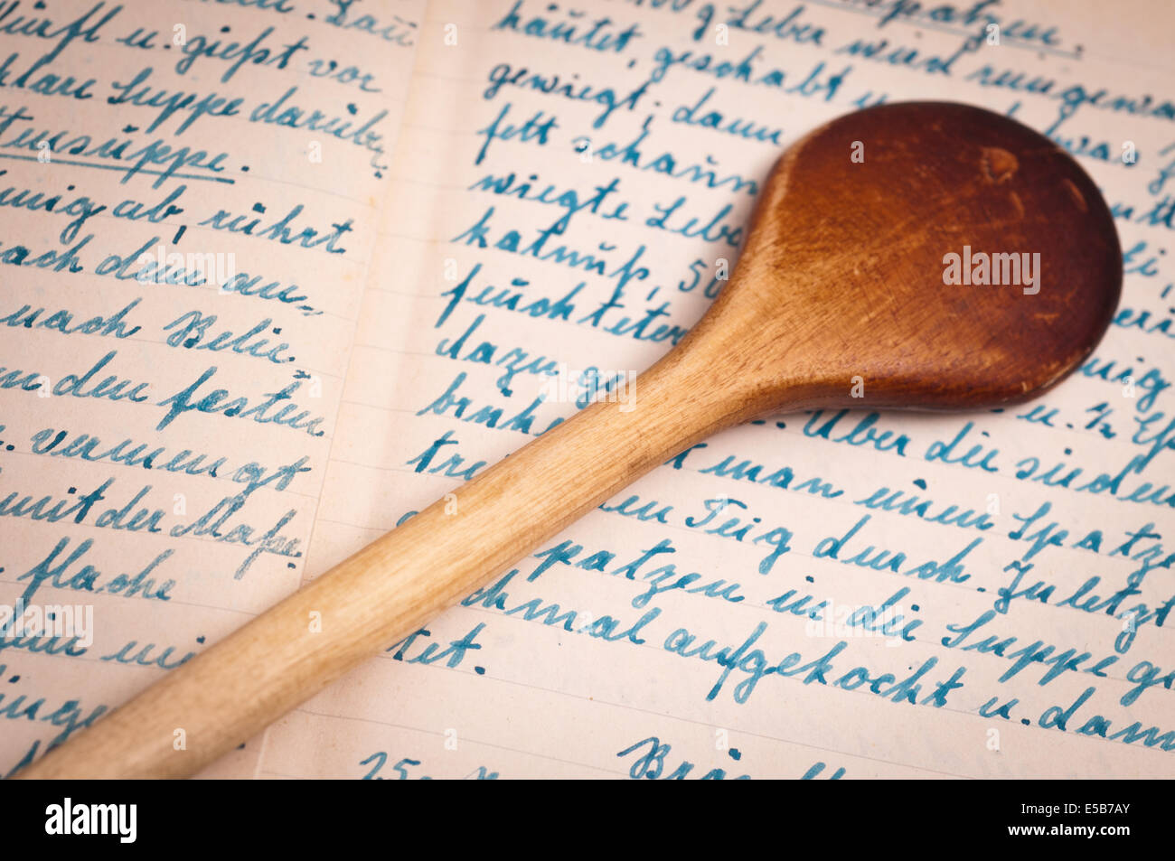 Handwritten recipe and a wooden cooking spoon Stock Photo Alamy