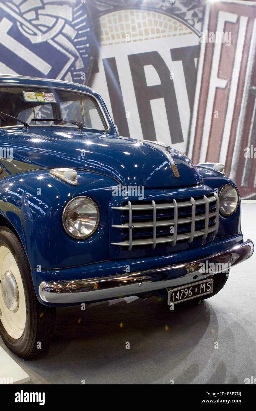 A 1952 Fiat 500C Belvedere in the FIAT stand displayed at historical cars show. Stock Photo