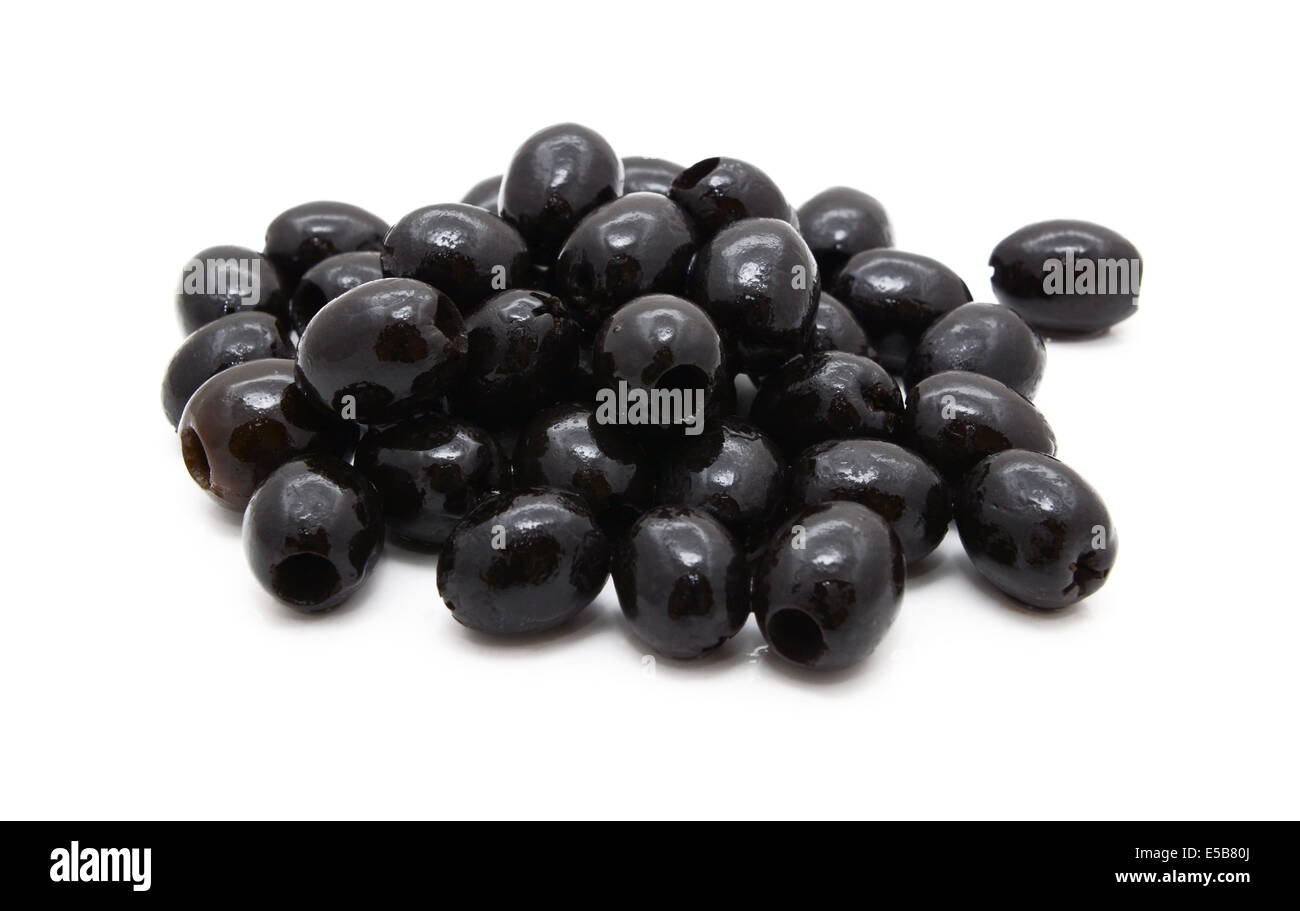 Pitted black olives in oil, isolated on a white background Stock Photo