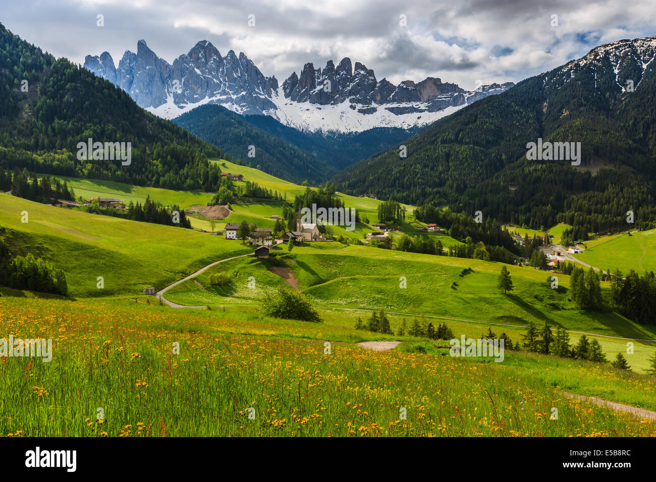 The Odle mountain peaks and the church of Santa Maddalena are the symbols of the Val di Funes Stock Photo