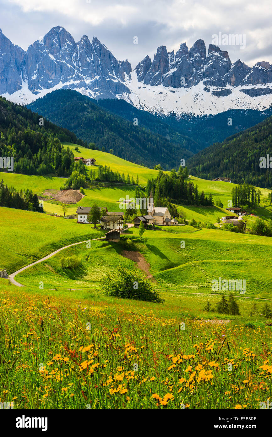The Odle mountain peaks and the church of Santa Maddalena are the symbols of the Val di Funes Stock Photo