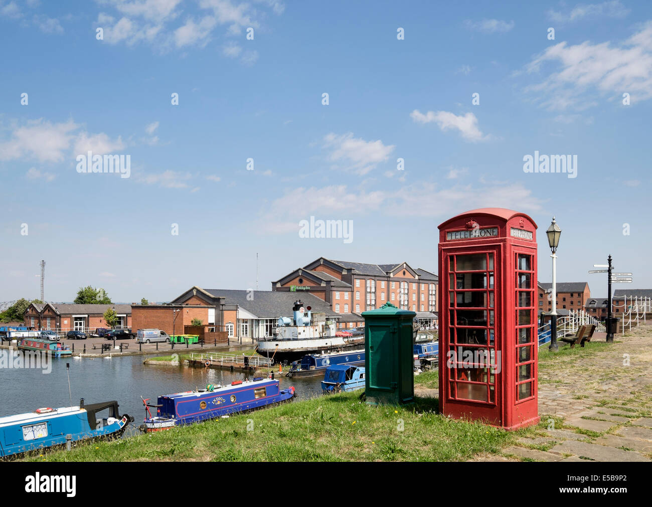 Red K6 telephone box by Shropshire Union Canal at National Waterways Museum Ellesmere Port Wirral Cheshire England UK Britain Stock Photo