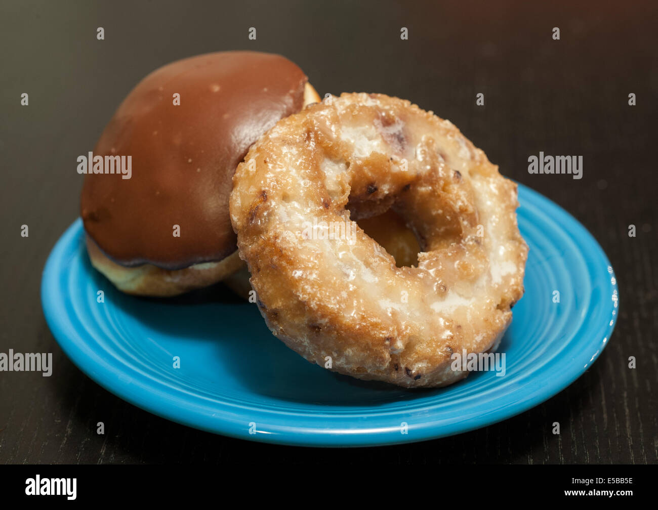 Two doughnuts on a plate. Stock Photo