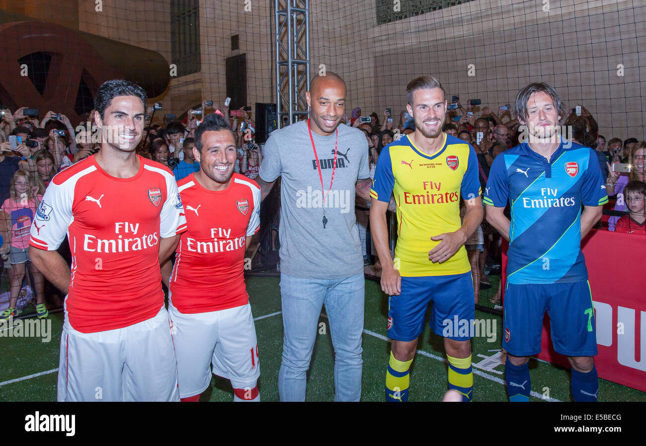 New York, NY, USA - July 25, 2014: (L-R) Footballers Santi Cazorla, Mikel  Arteta, Thierry Henry, Aaron Ramsey and Tomas Rosicky greet fans at the PUMA  partners with Arsenal Football Club to