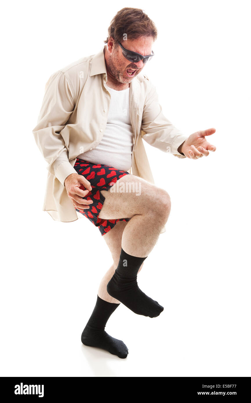 Fifty year old man in his underwear and sunglasses playing air guitar.  Isolated on white Stock Photo - Alamy