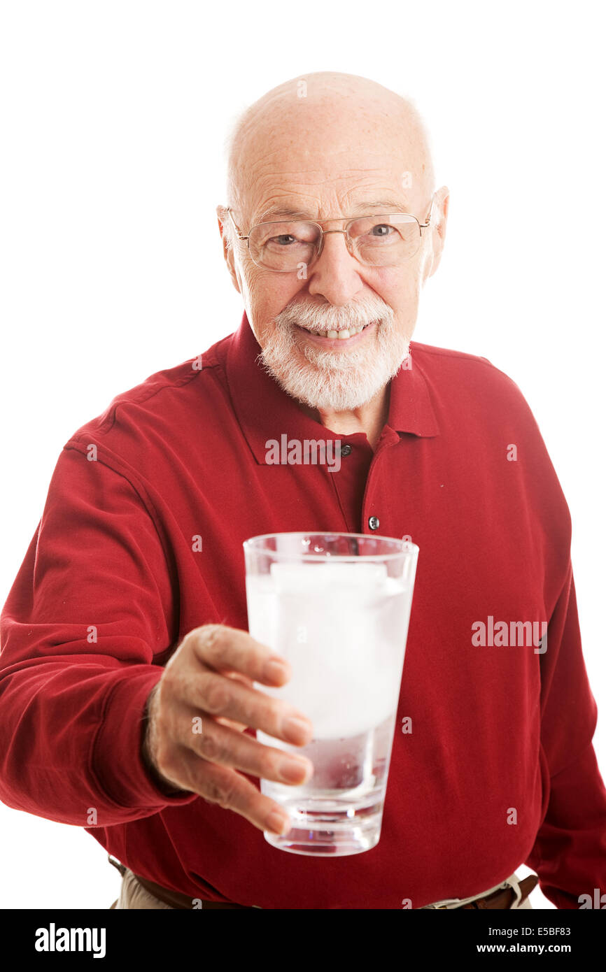 Senior man holding a glass of iced water. Isolated on white Stock Photo ...