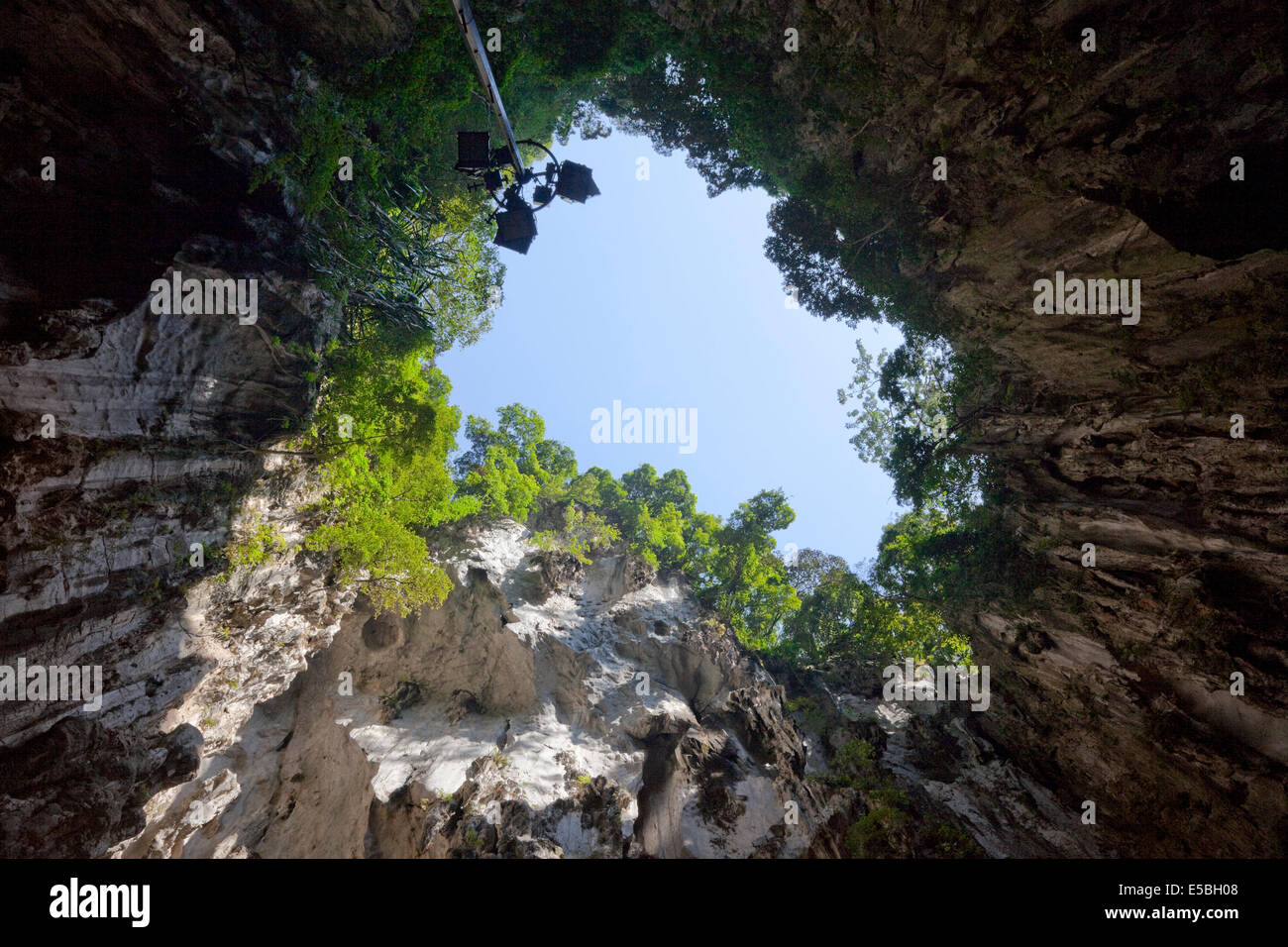 Karst, limestone formations, Malaysia, Perak state. Tropical rainforest growing on the top around the collapsed roof (water eros Stock Photo