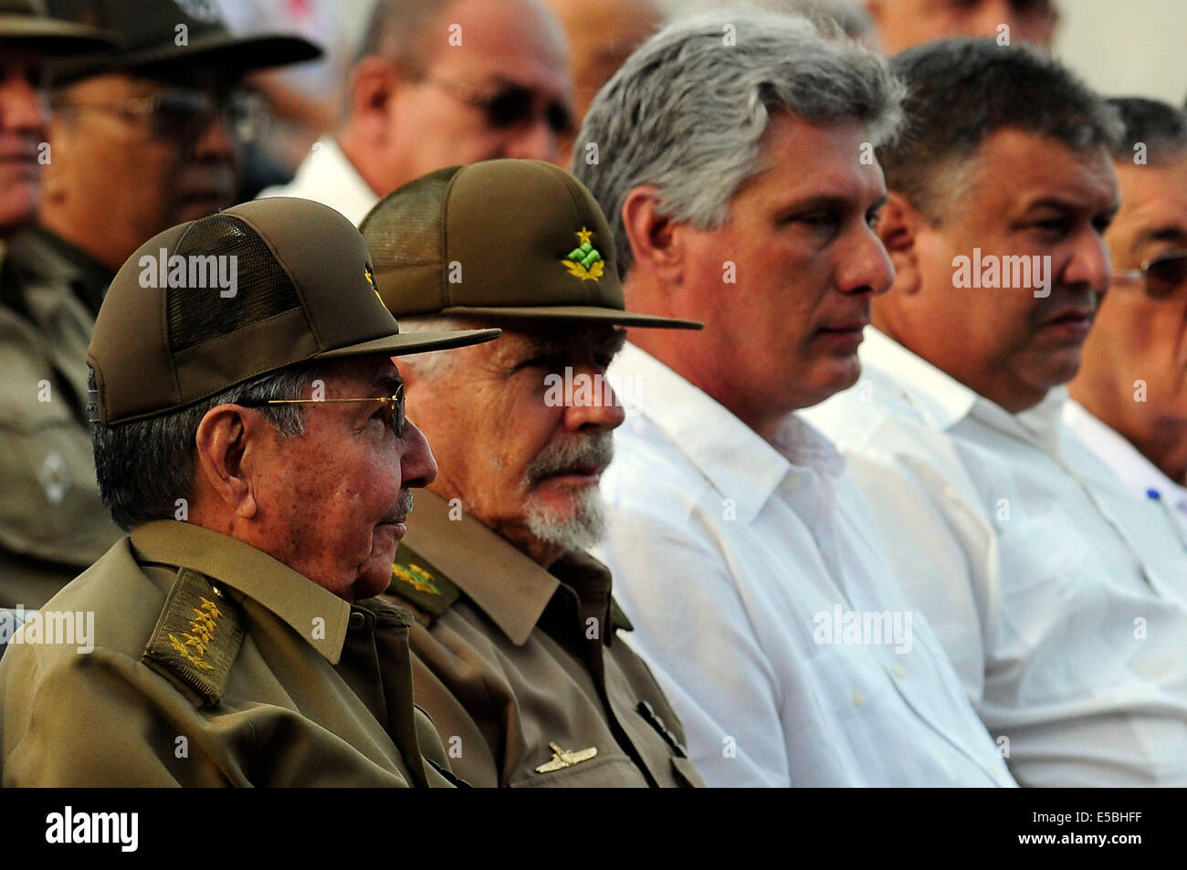 Artemisa, Cuba. 26th July, 2014. The President of Cuba, Raul Castro(1st L) attends the commemoration ceremony of the National Rebellion Day, in the Mausoleum of the Martyrs, in Artemisa town, Havana Province, Cuba, on July 26, 2014. On July 26, 1953 was the beginning of the Cuban Revolution led by Fidel Castro. Credit:  Str/Xinhua/Alamy Live News Stock Photo