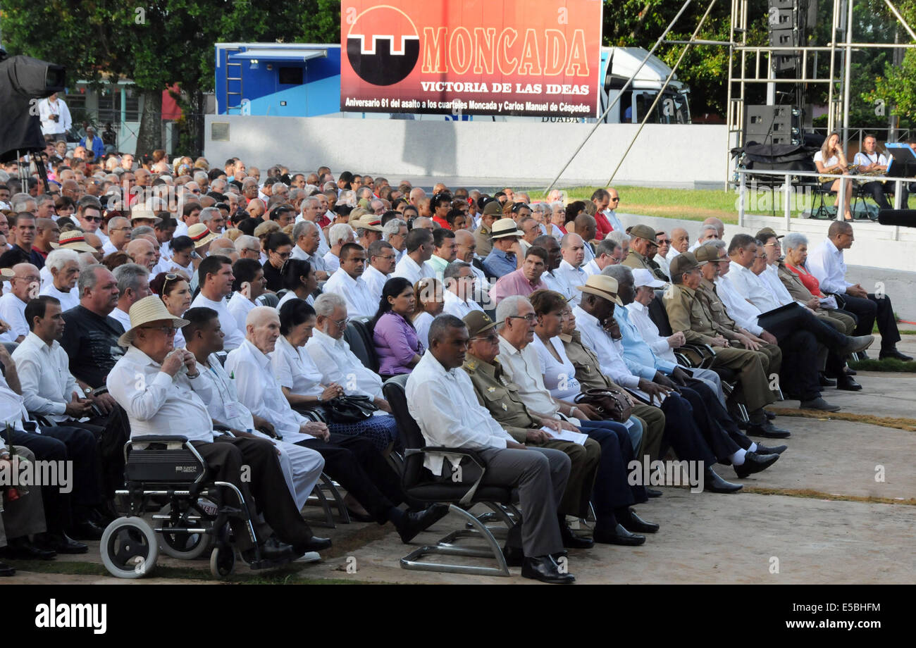 Artemisa, Cuba. 26th July, 2014. People attend the commemoration ceremony of the National Rebellion Day, in the Mausoleum of the Martyrs, in Artemisa town, Havana Province, Cuba, on July 26, 2014. On July 26, 1953 was the beginning of the Cuban Revolution led by Fidel Castro. Credit:  Prensa Latina/Xinhua/Alamy Live News Stock Photo