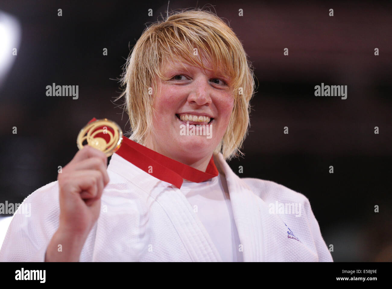 SECC, Glasgow, Scotland, UK, Saturday, 26th July, 2014. Scotland's Sarah Adlington celebrates winning Gold in the Women's +78kg Judo Final at the Glasgow 2014 Commonwealth Games Stock Photo