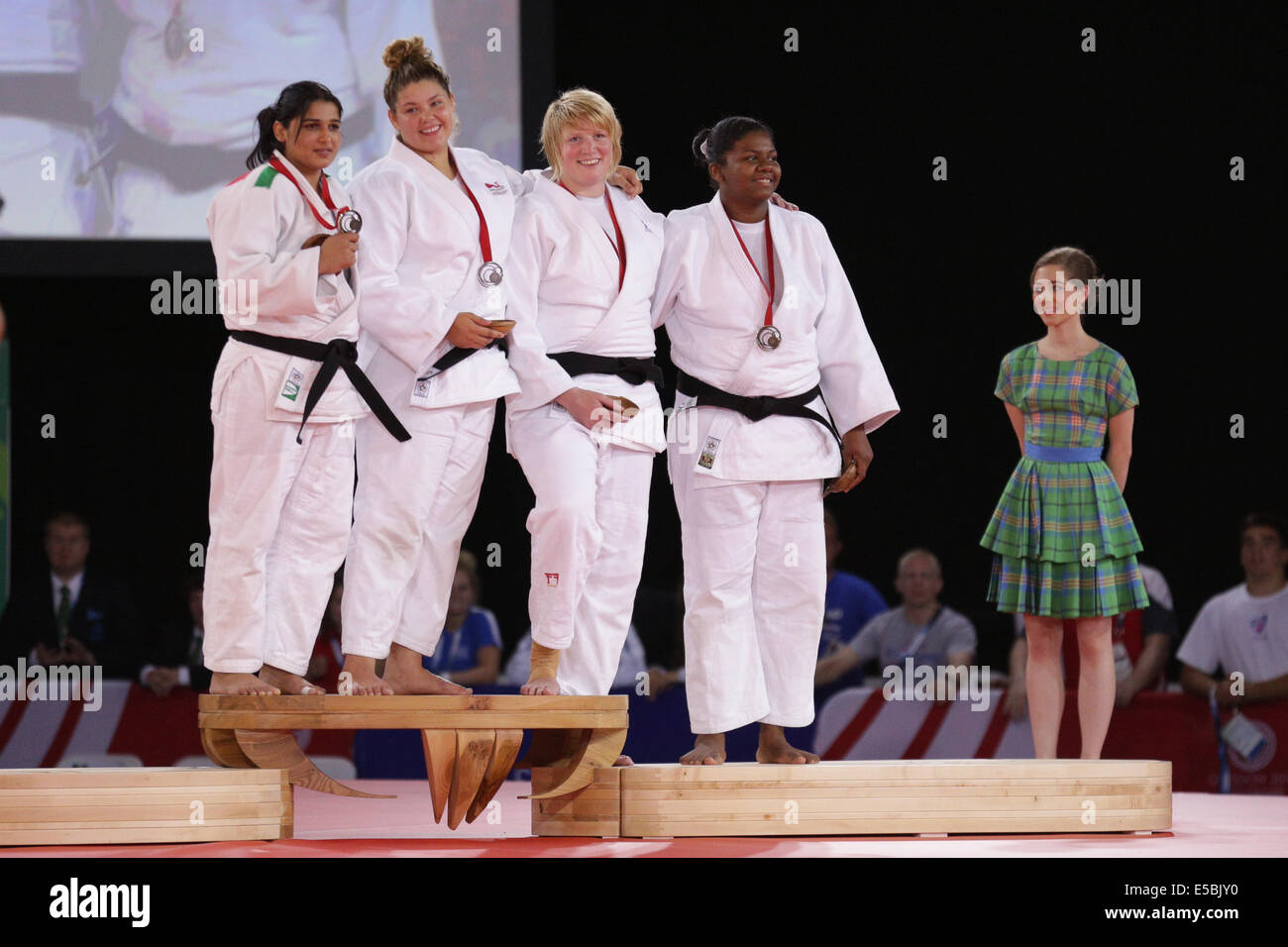 SECC, Glasgow, Scotland, UK, Saturday, 26th July, 2014. The Medal Winners in the Women's +78kg Judo Competition at the Glasgow 2014 Commonwealth Games. Left to Right, Rajwinder Kaur, India, Bronze, Jodie Myers, England, Silver, Sarah Adlington, Scotland, Gold, Annabelle Laprovidence, Mauritius, Bronze Stock Photo