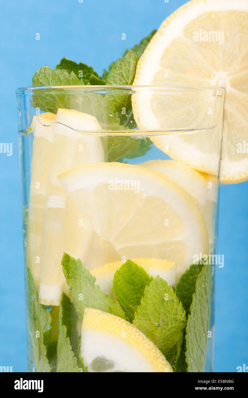 lemon and mint water drink in blue background Stock Photo Alamy