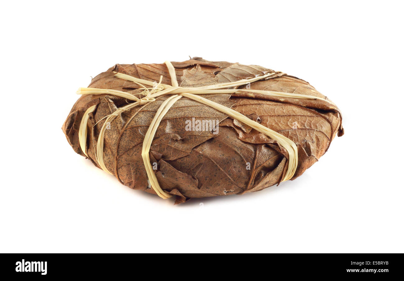 Banon cheese wrapped in leaves isolated on white background Stock Photo