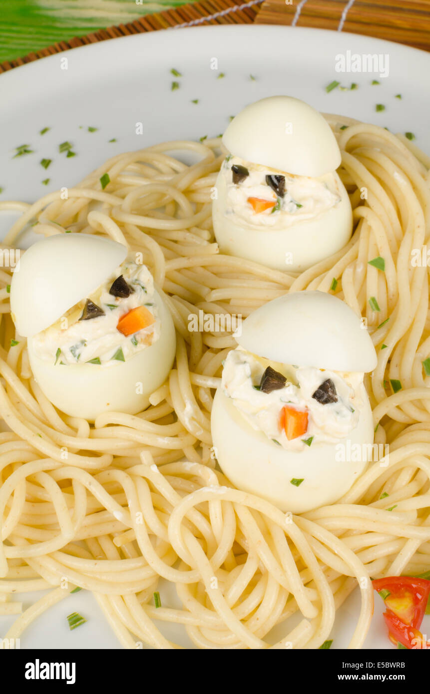 A Pasta Nest With Birds Made Of Eggs A Funny Kid Meal Stock Photo Alamy