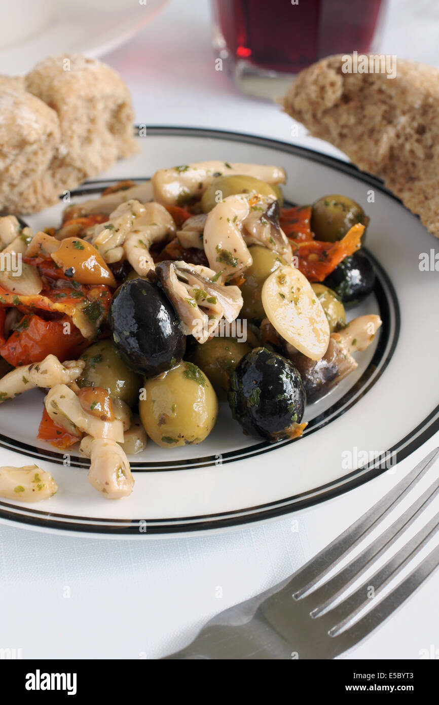 Antipasti made with olives sun dried tomato and shitake mushrooms Stock Photo