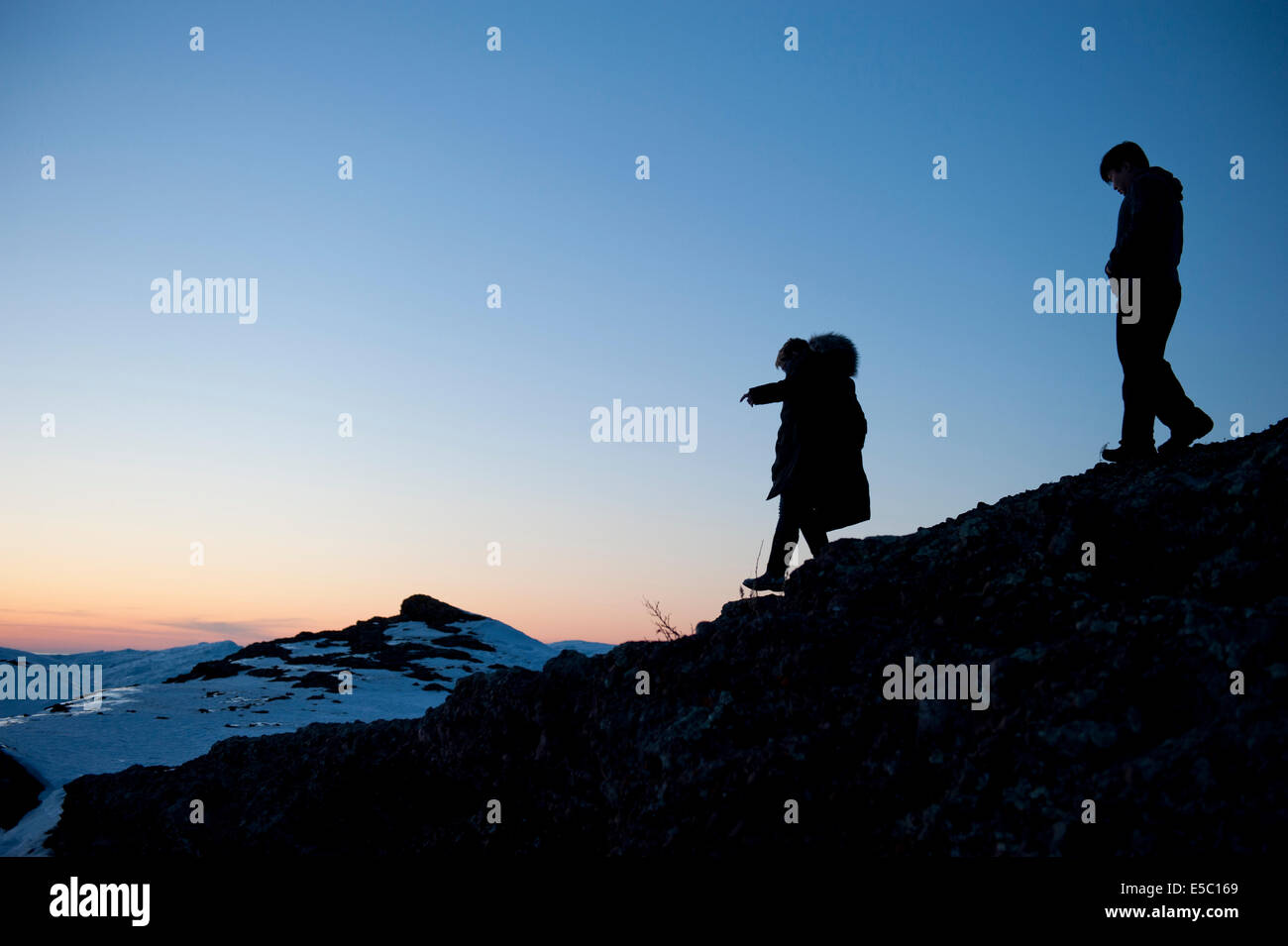 A silhouette of a couple walking away from each other Stock Photo - Alamy