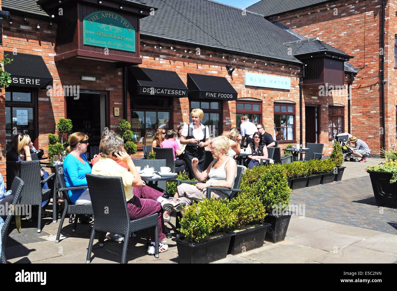 Pavement cafe on the waterfront in Barton Marina, BartonunderNeedwood