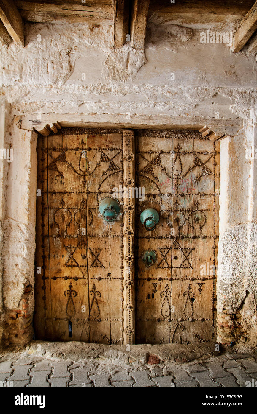 Traditional door (knobs) in the old town of Nefta (Medina) an oasis in the Saharan desert. Stock Photo