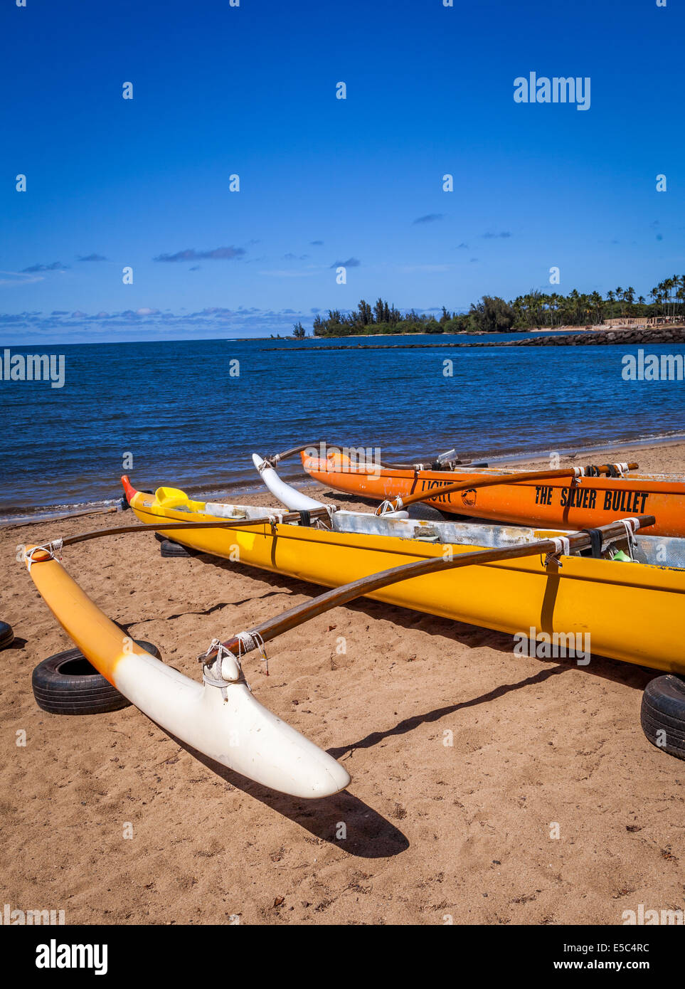 Outrigger canoes on beach on North Shore of Oahu, Hawaii Stock Photo