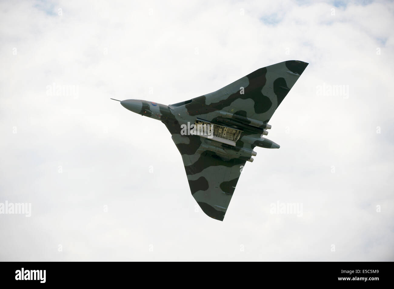 Yeovilton, UK. 26th July, 2014. Air display at RNAS Yeovilton.  Vulcan XH558 piloted by Martin Withers DFC. Credit:  David Hammant/Alamy Live News Stock Photo