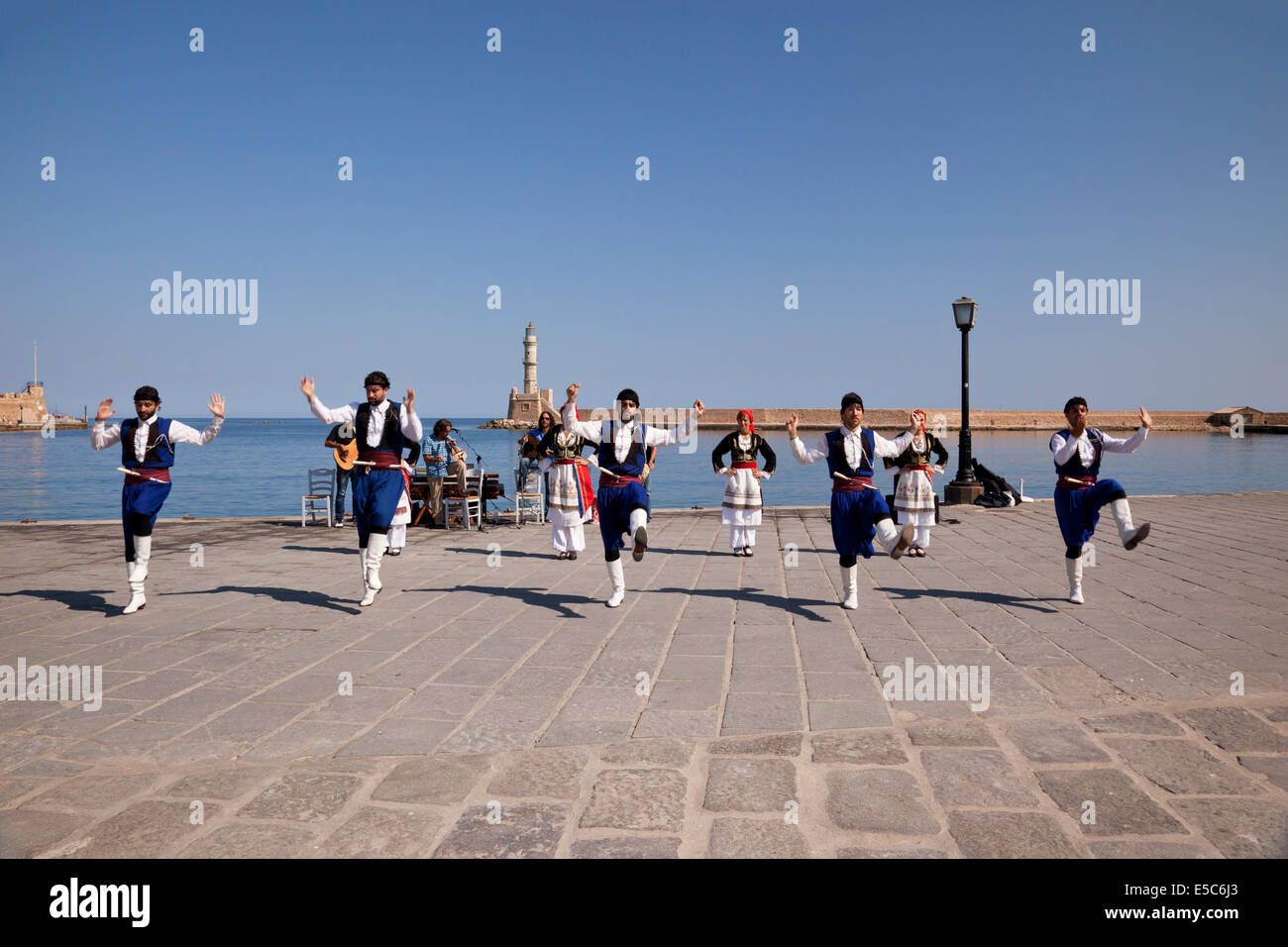 Tradional Greek Cretan Dancers, Chania harbour, Crete, Greece Stock Photo