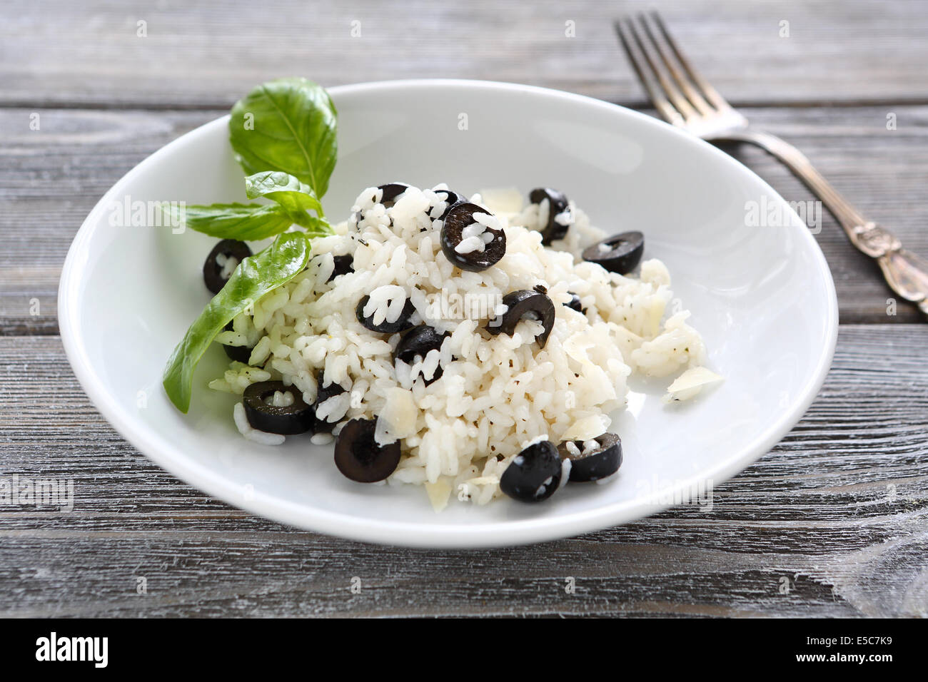 risotto with slices of black olives, food closeup Stock Photo - Alamy