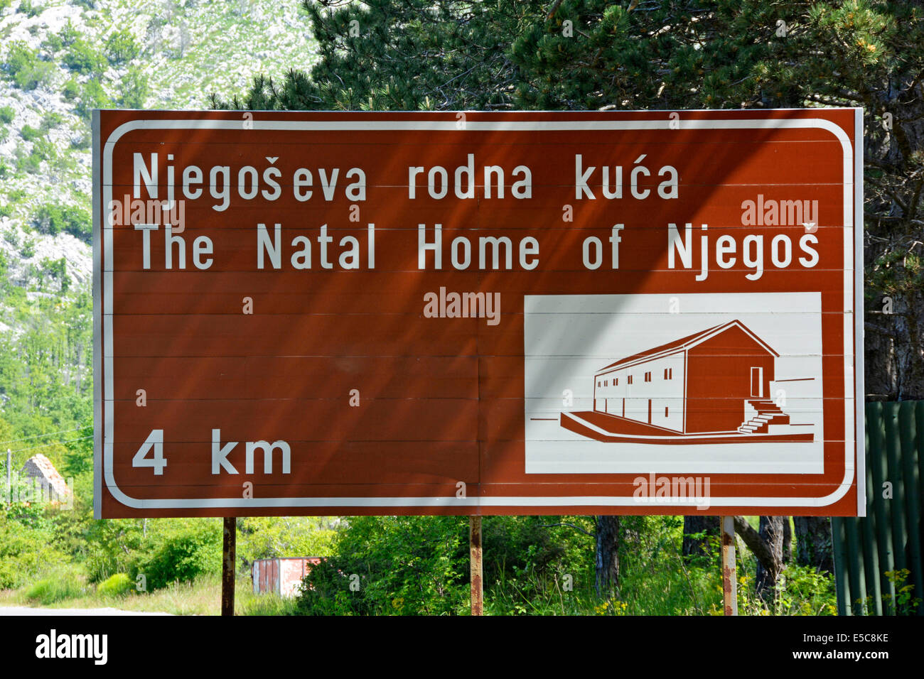 Brown tourist information roadside sign for the Natal Home of Njegos located within Lovćen National Park in Montenegro Stock Photo