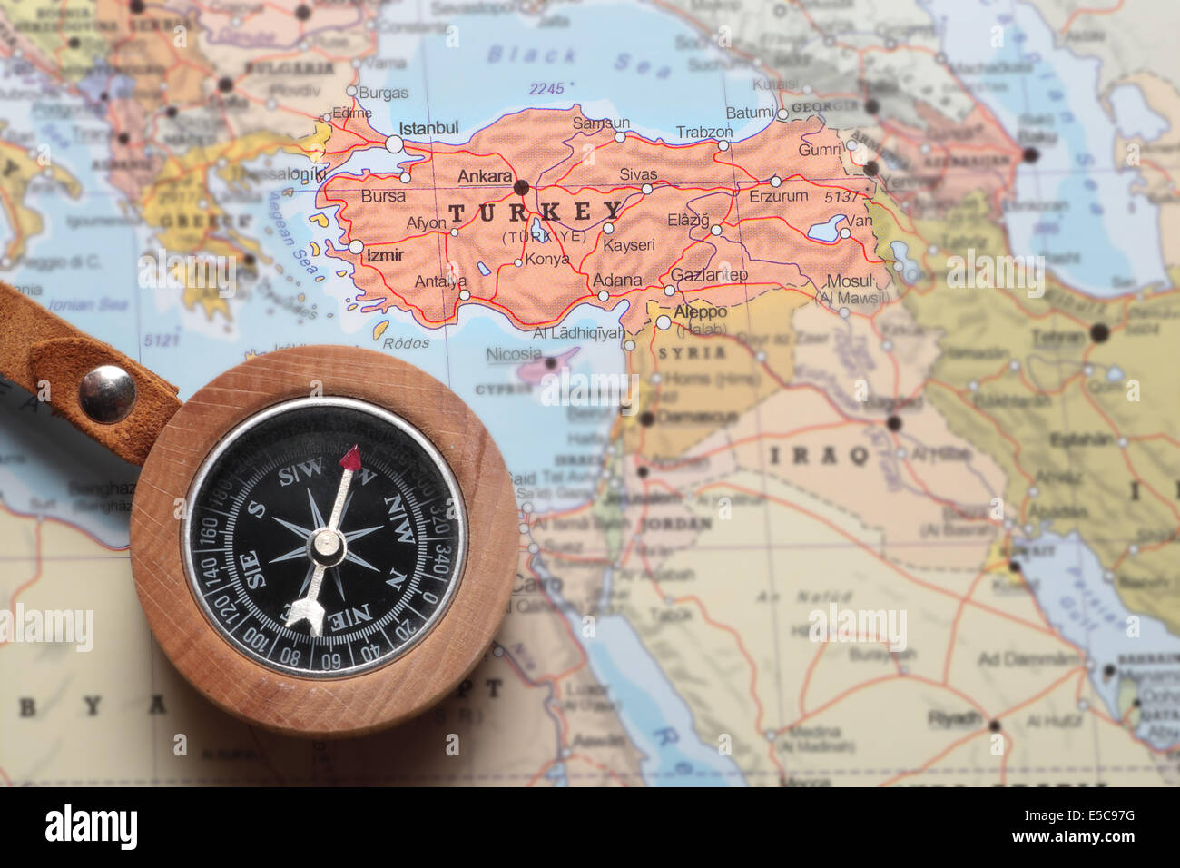 Compass on a map pointing at Turkey and planning a travel destination Stock Photo