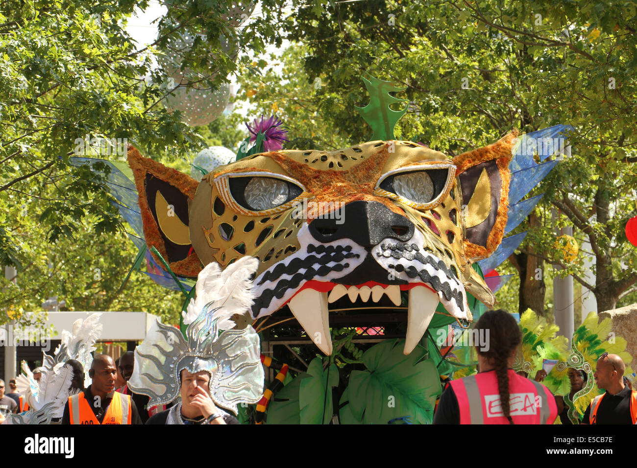 London, UK. 27 July 2014. A carnival float makes it way around the Queen Elizabeth Park in Newham. Credit: David Mbiyu/ Alamy Live News Stock Photo