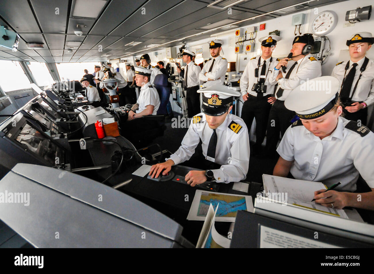 Belfast, Northern Ireland. 26/07/2014 - Officers on the bridge of the newest ship in the Royal Navy, the Type 45 destroyer HMS Duncan, steer her into her adopted city of Belfast for a three day visit. Credit:  Stephen Barnes/Alamy Live News Stock Photo