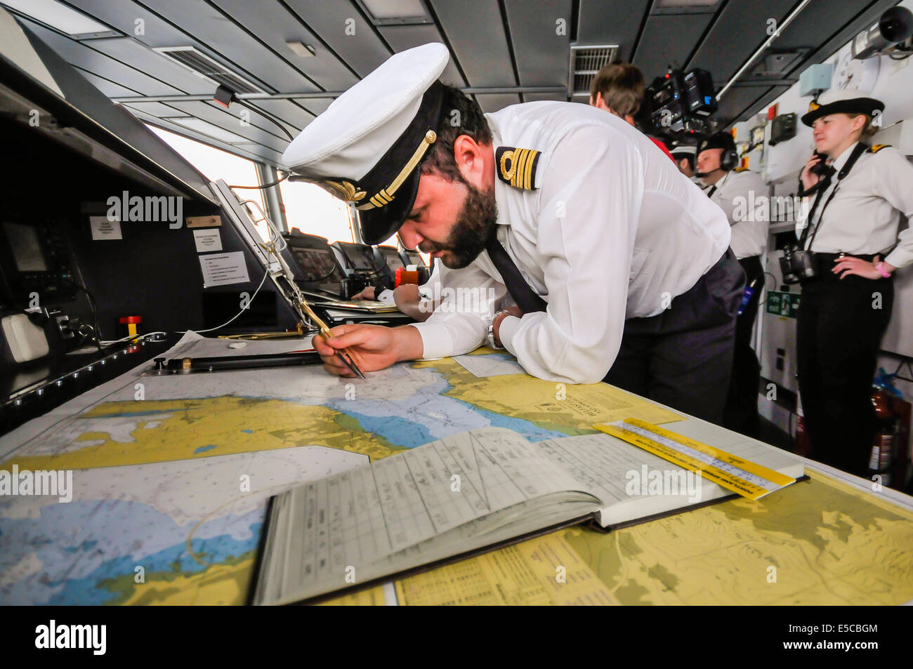 Belfast, Northern Ireland. 26/07/2014 - Navigation officer checks course as the newest ship in the Royal Navy, the Type 45 destroyer HMS Duncan, arrives into her adopted city of Belfast for a three day visit. Credit:  Stephen Barnes/Alamy Live News Stock Photo