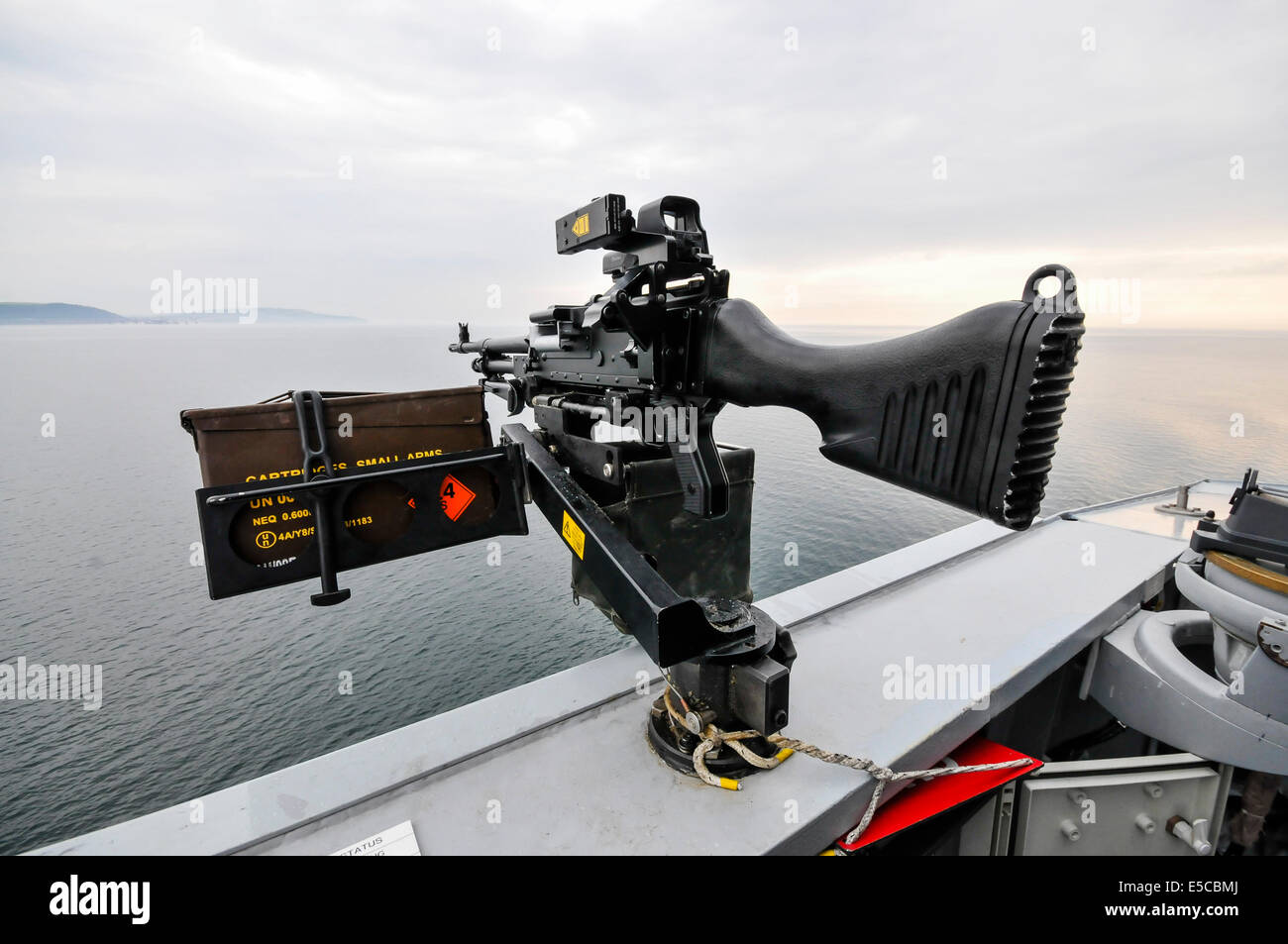 Belfast, Northern Ireland. 26/07/2014 - General Purpose Machine Gun (GPMG) with box of ammunition, mounted on the Royal Navy Type 45 destroyer HMS Duncan Credit:  Stephen Barnes/Alamy Live News Stock Photo