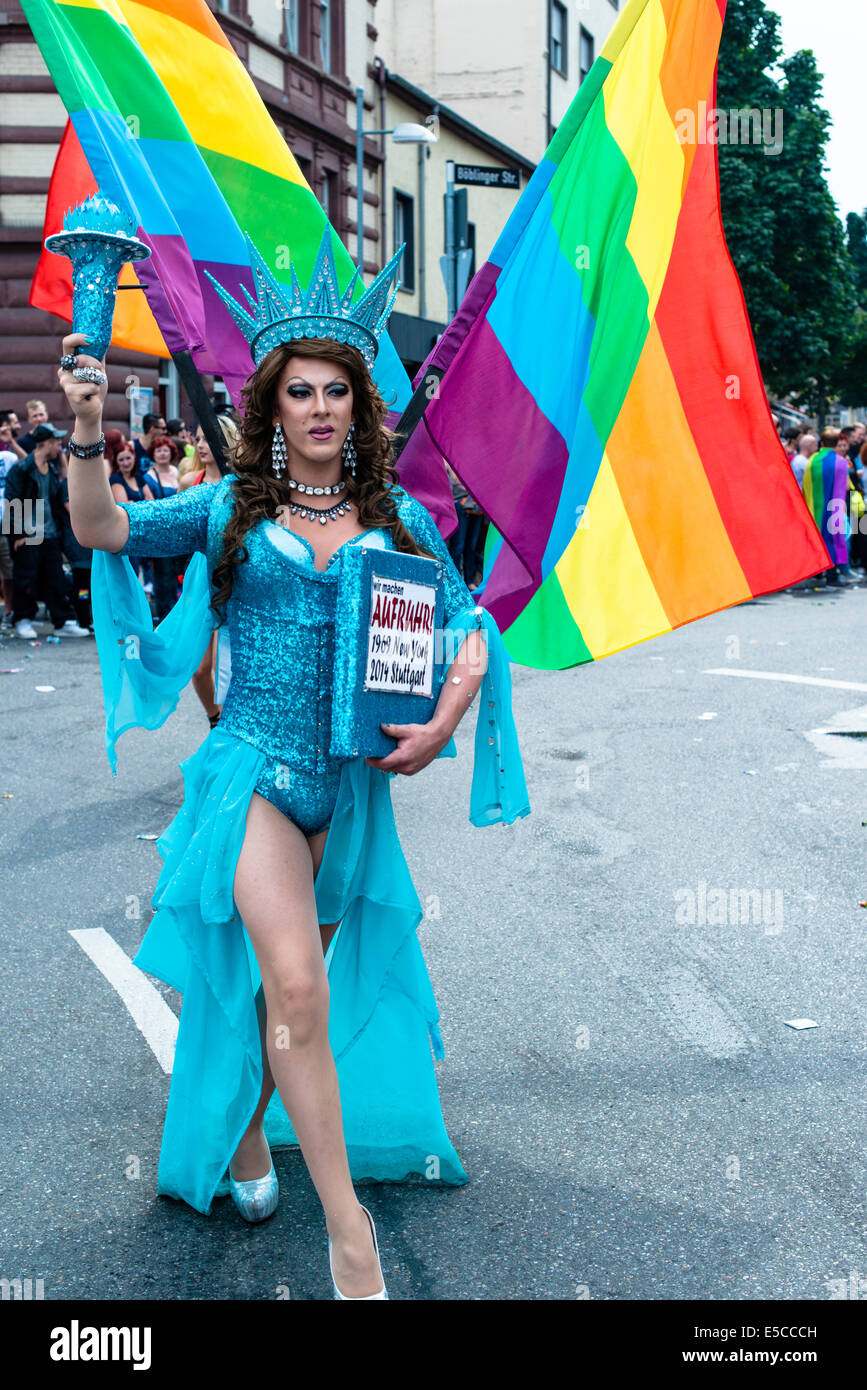 Stuttgart, Germany - July 26, 2014: A participant of Christopher Street Day (CSD) parade being elaborately dressed as Statue of Stock Photo