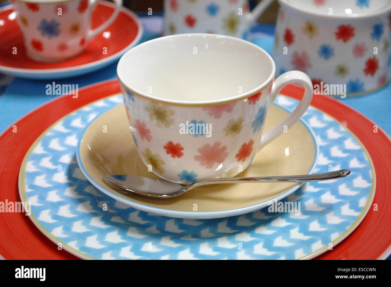 Cup and saucer with teaspoon from the Villeroy & Boch Lina tableware pattern. Stock Photo