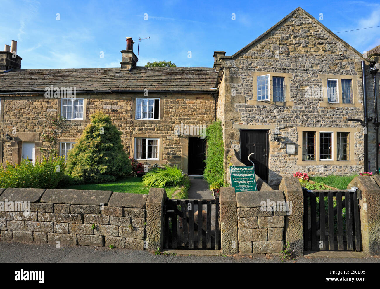 Plague Cottages in Eyam plague village, Derbyshire, Peak District National Park, England, UK. Stock Photo