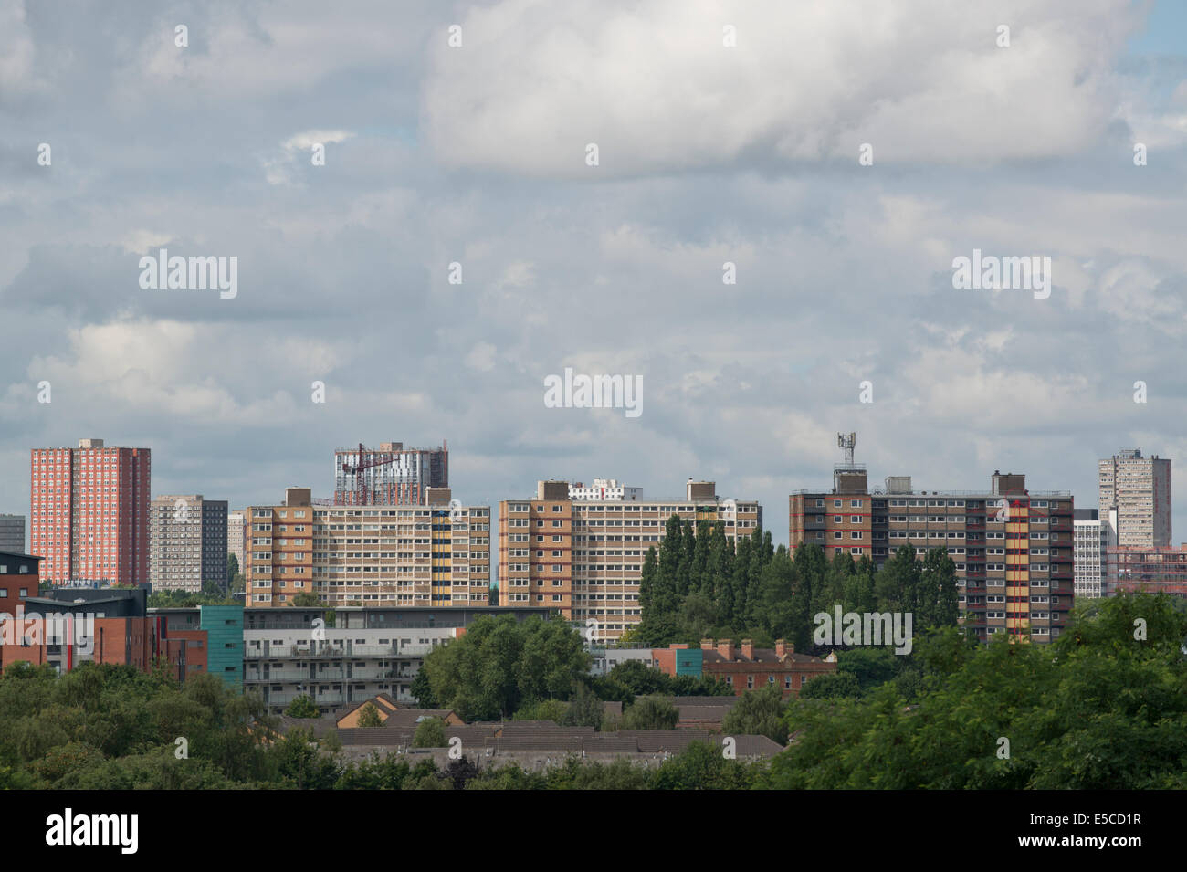 The skyline of the Pendleton area of the Greater Manchester city of Salford, featuring high-rise flats on a cloudy overcast day. Stock Photo