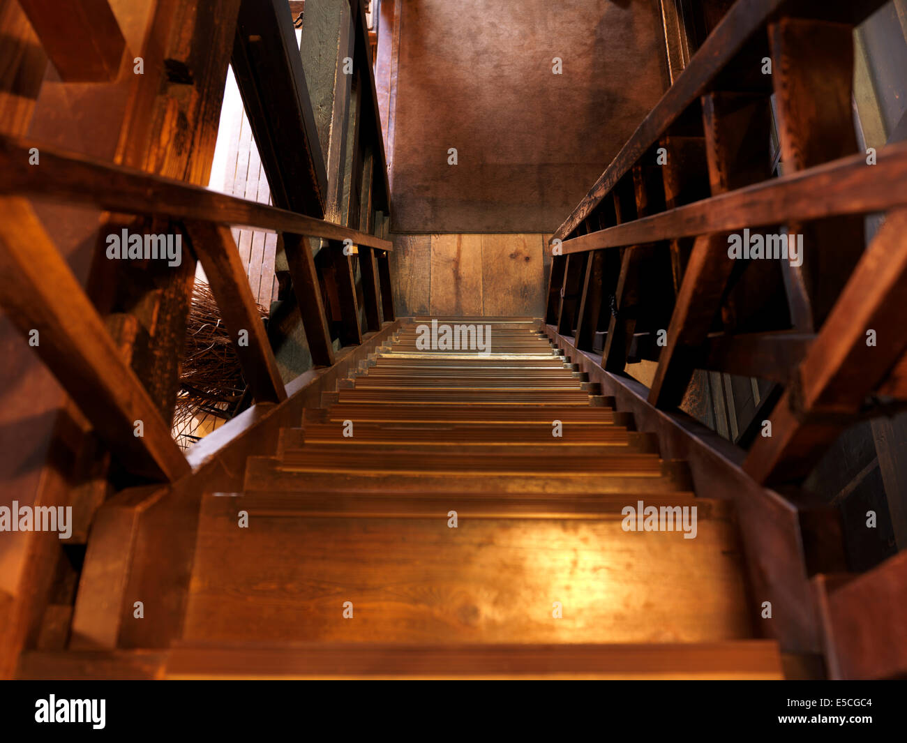 Old wooden staircase leading downstairs Stock Photo