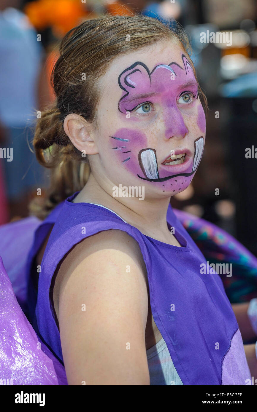 A girl with her face painted as an imaginary animal at the 2014 Summer Solstice Parade, Santa Barbara, California Stock Photo