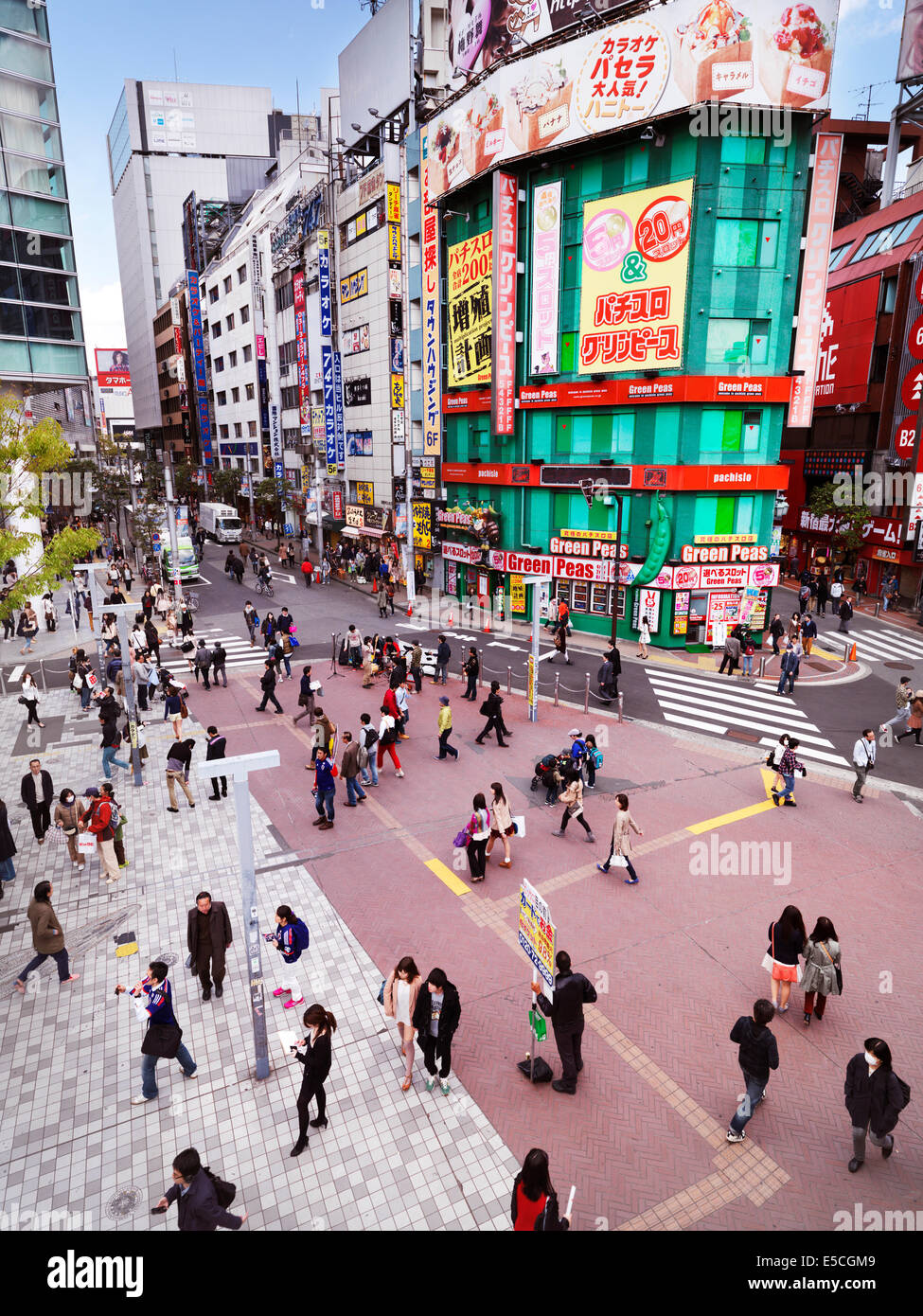 People on a plaza at Shinjuku JR station South exit in Shinjuku, Tokyo, Japan 2014 Stock Photo