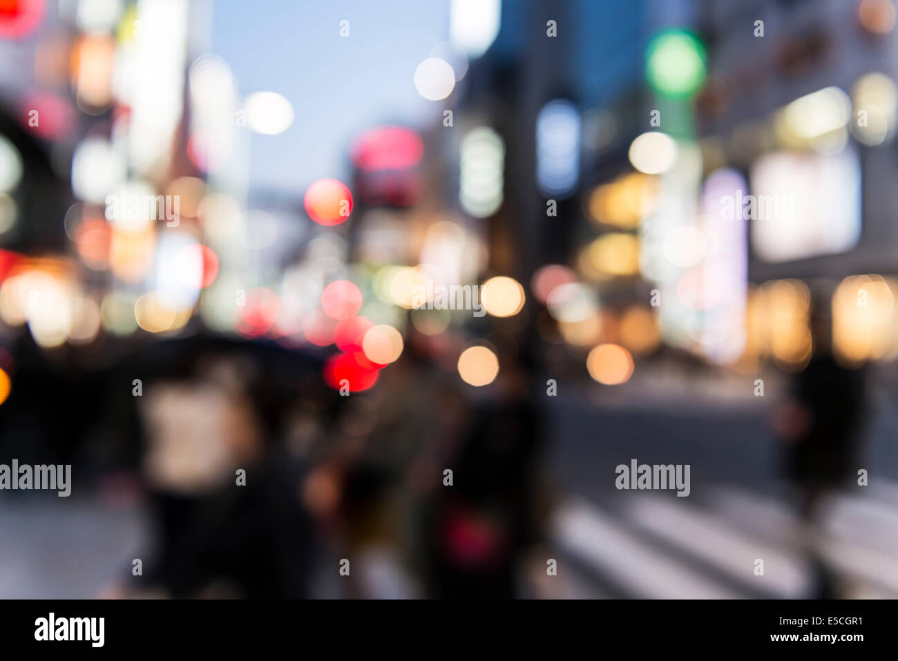 Abstract out-of-focus city scenery with colorful lights. Tokyo, Japan. Stock Photo