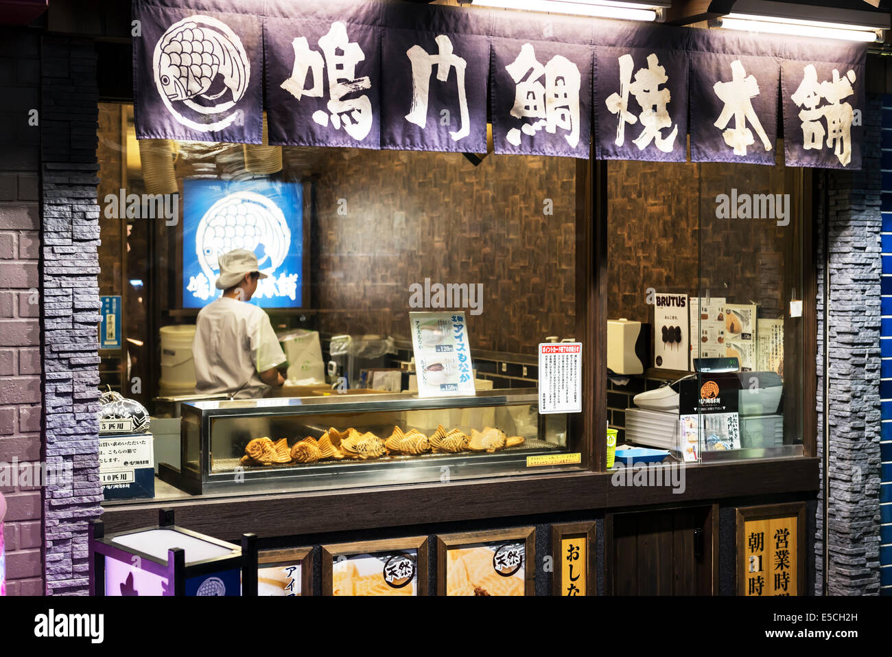 Taiyaki shop in Tokyo Japan selling fishshaped waffle filled with red