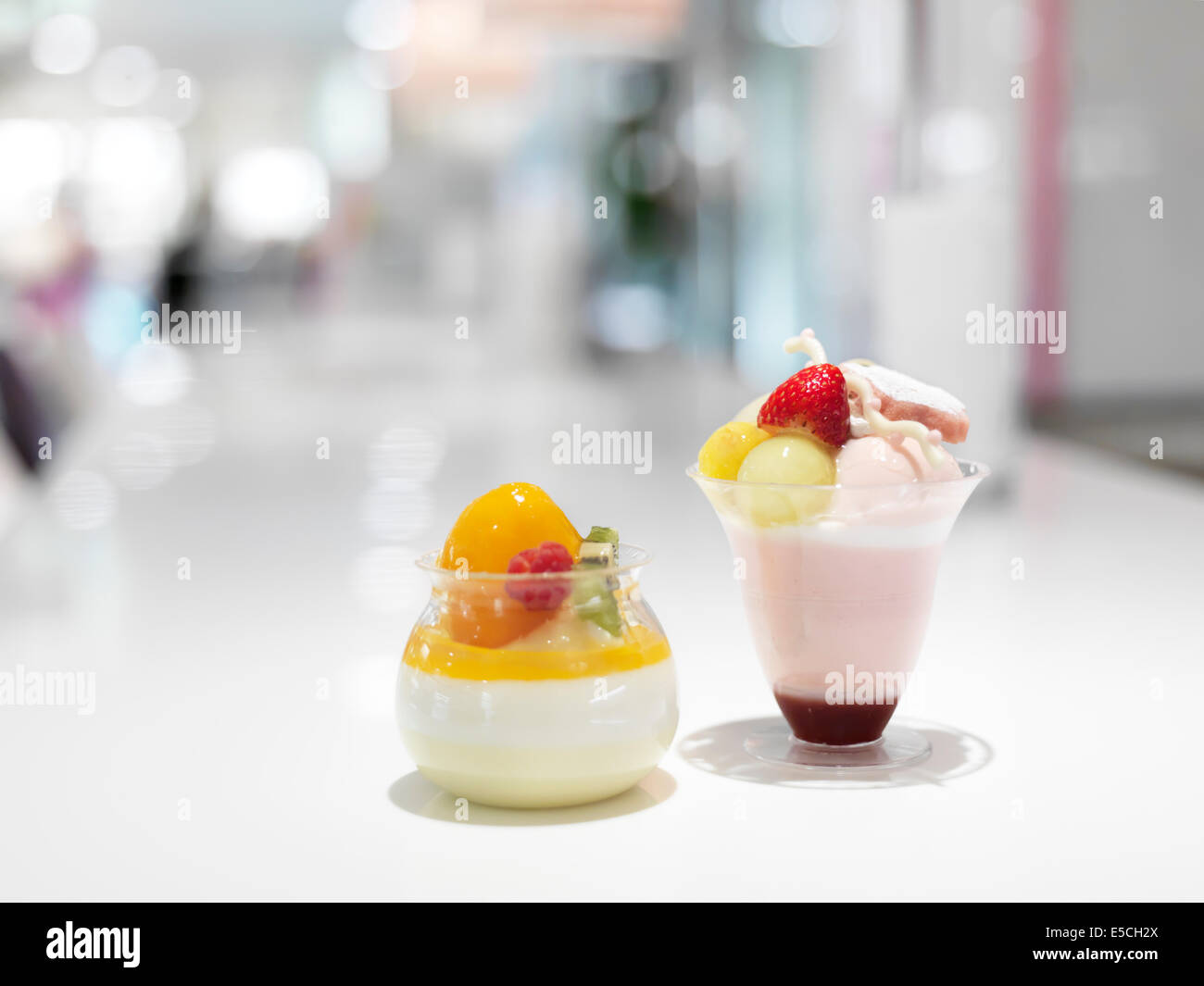 Ice cream and fruit parfait glasses at a cafe Stock Photo