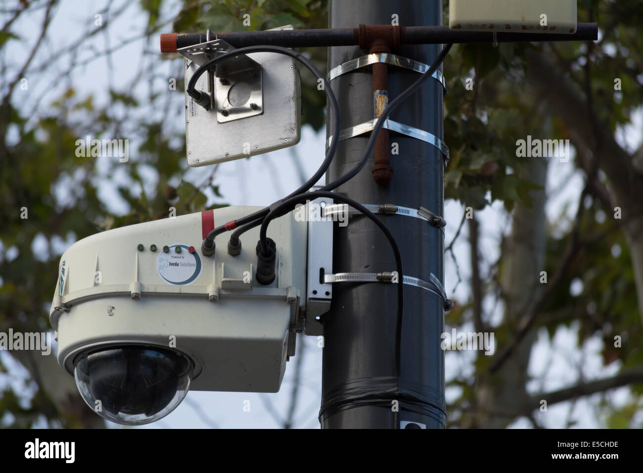 Surveillance camera on light pole Stock Photo Alamy