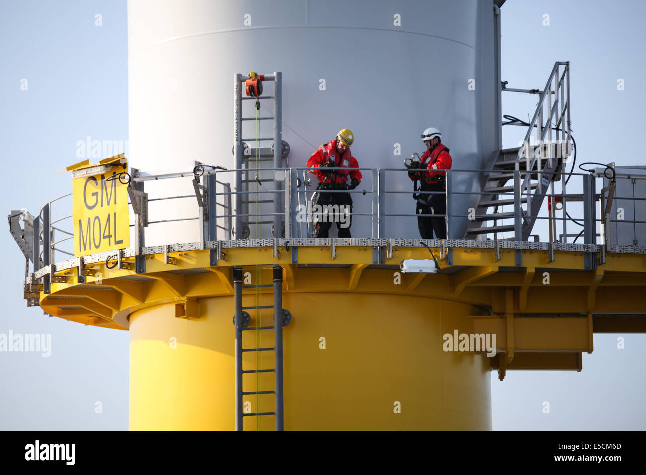 Workers on a turbine tower on the Gwynt y Mor Wind Farm off the coast of North Wales during the Construction Phase in 2014. Stock Photo