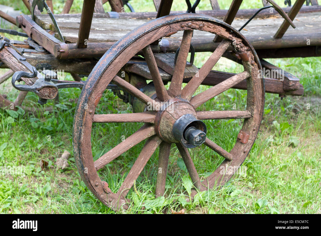 Old vintage wooden wheel closeup Stock Photo