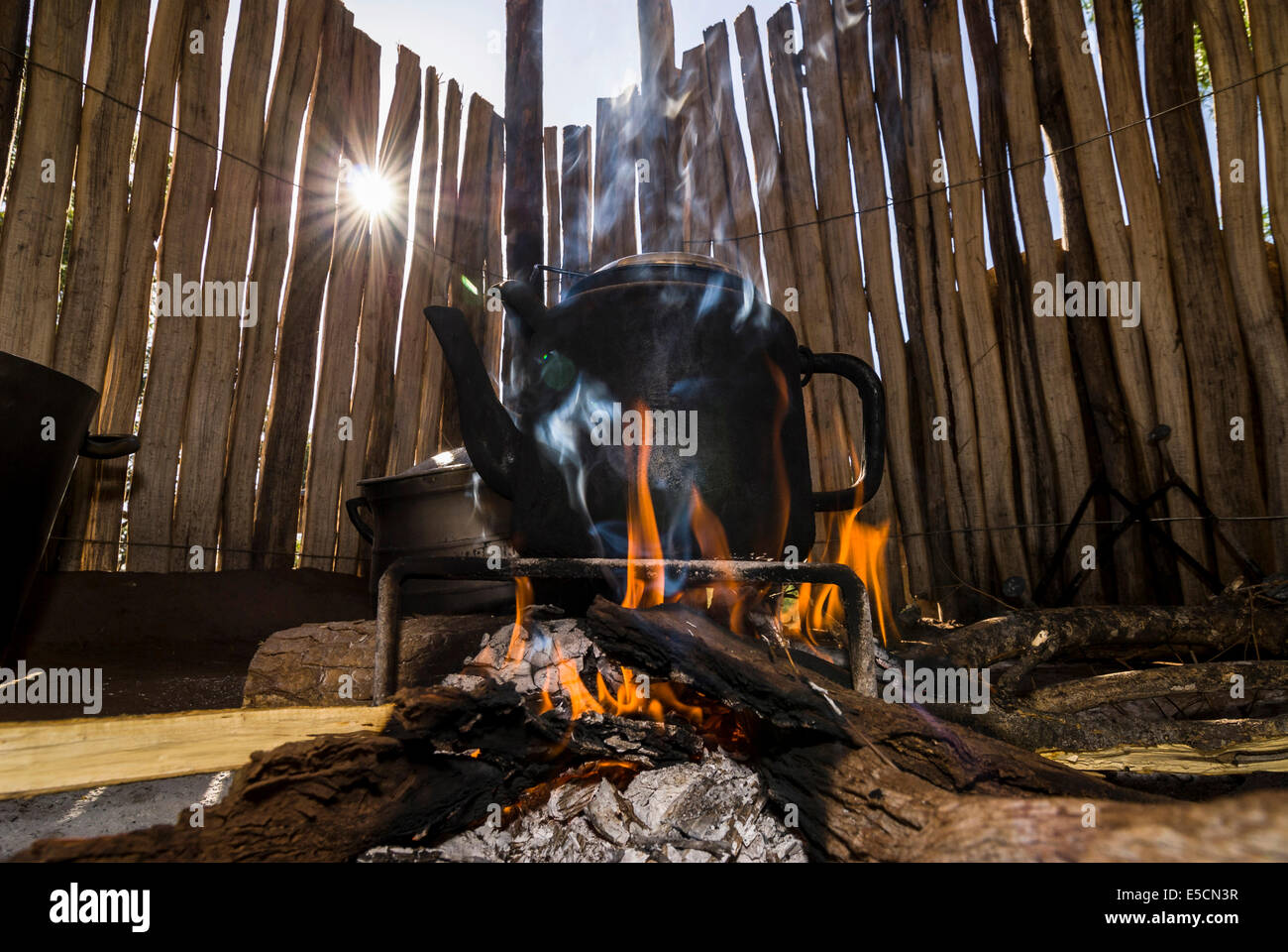 Kettle over an open fire in the kitchen, backlit, Thohoyandou, Venda