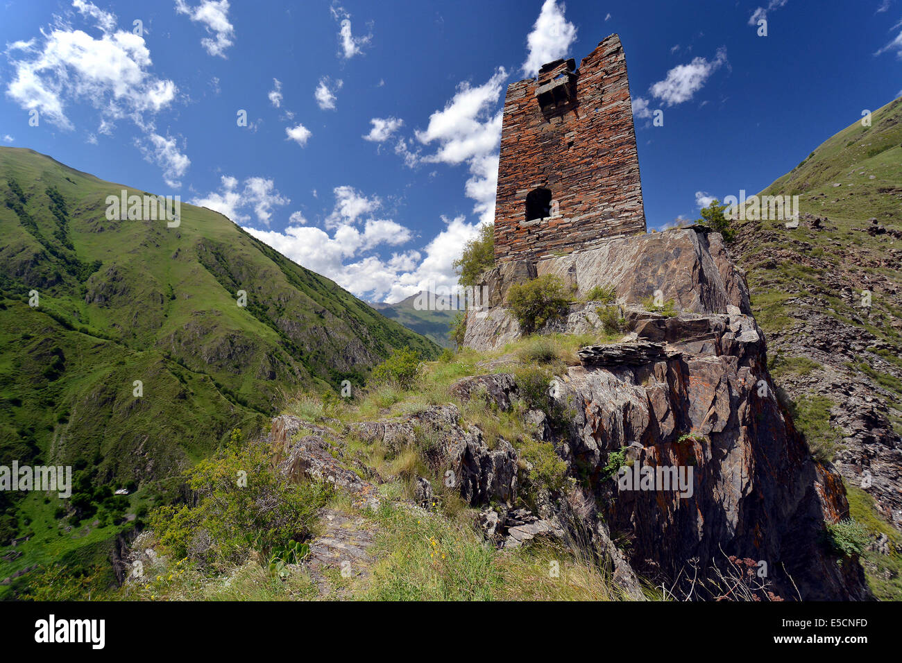 Ruins of a medieval defensive and residential tower on a hilltop, Mutso, High Caucasus, Mtskheta-Mtianeti region, Georgia Stock Photo